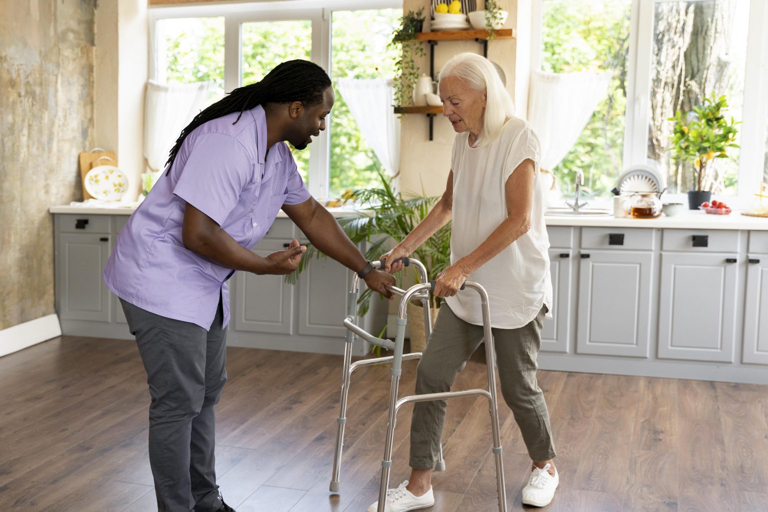 male-social-worker-taking-care-old-woman